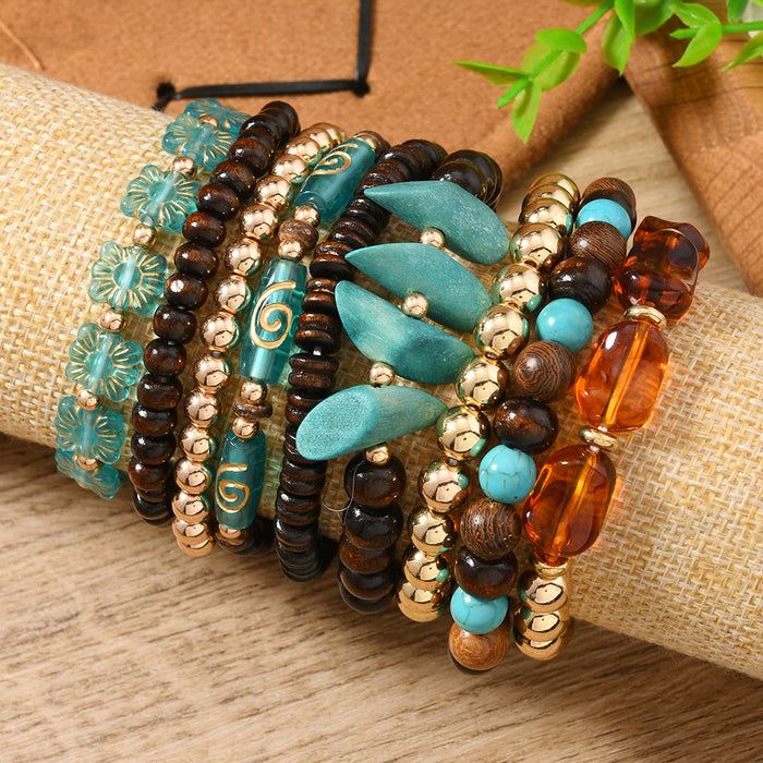 Wholesale Women' s stackable set of 9 wooden and acrylic beaded handmade bracelets.