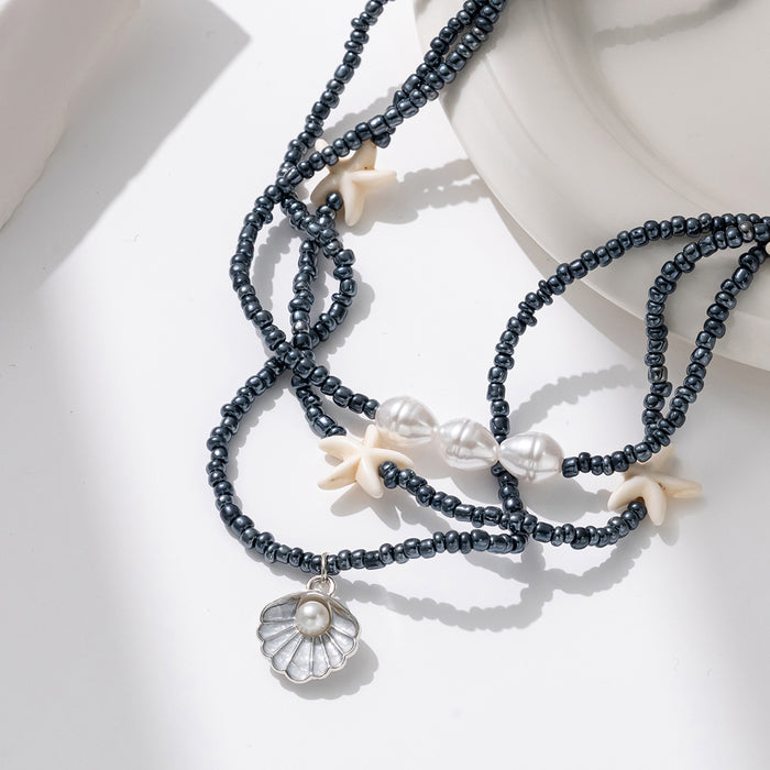 Wholesale New stacked black bead starfish necklace shell pendant necklace, personalized and fashionable collarbone chain