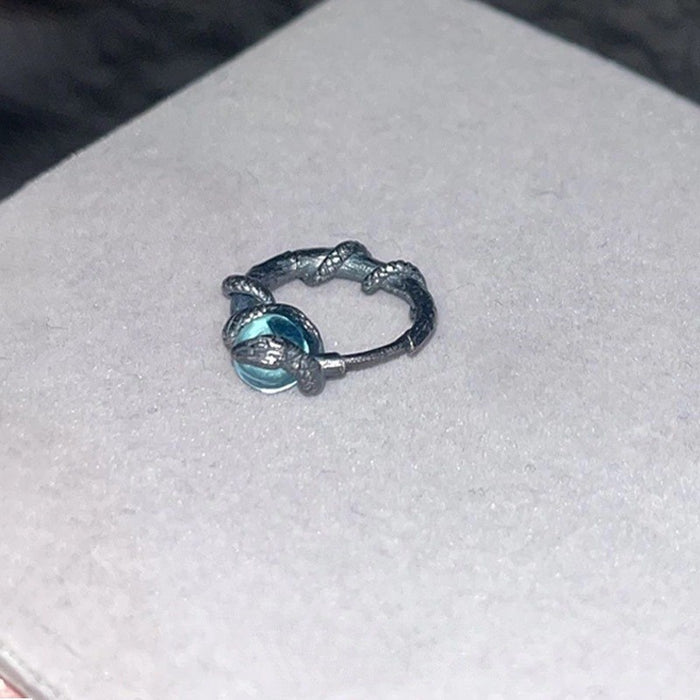 Wholesale Silver snake wrapped imitation moonstone ear buckle, light luxury, niche high-end design, spirit snake earrings, versatile earrings