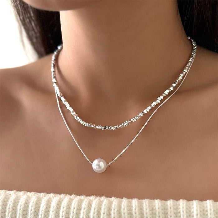 Wholesale Jewelry imitation pearl pendant necklace layered for high-end, light luxury, niche, irregular collarbone chain accessories