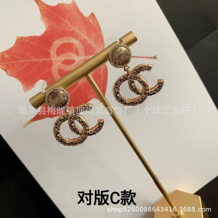 Wholesale Double-C Pearl Earrings 925 Silver Needle Studs