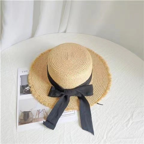Wholesale Big brim frayed Lafite grass hat women's beach hat for beach vacation, sun protection and sunshade hat