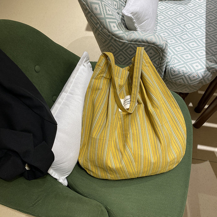 Wholesale Splicing striped canvas bag with simple temperament and large capacity commuting shoulder bag
