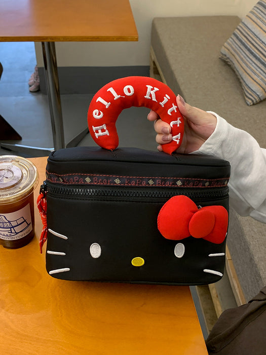 Wholesale Cute black kitten handbag with cartoon bow,  a storage and makeup bag.