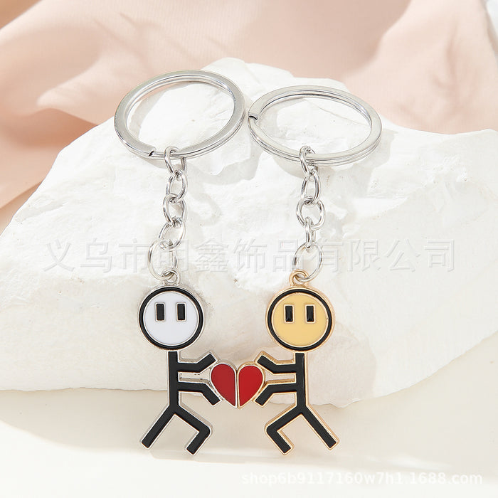 Wholesale Stick figure couple funny magnetic heart splicing keychain