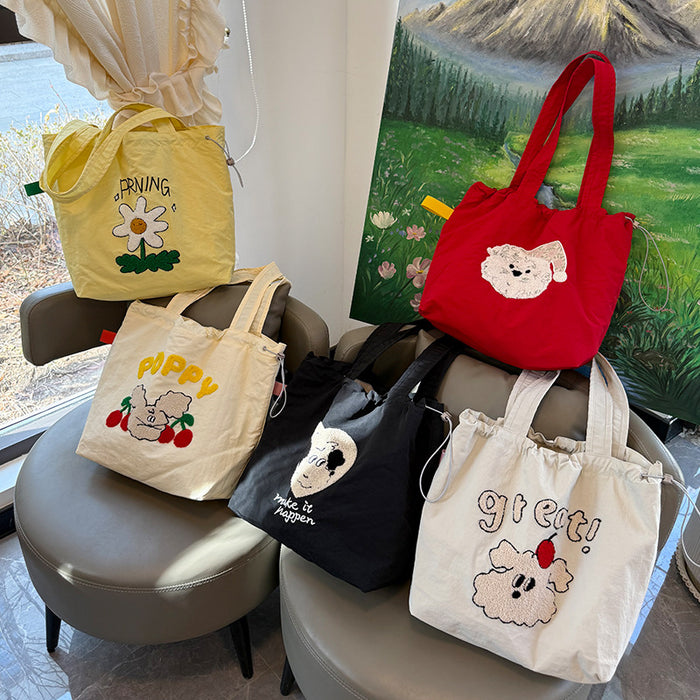 Wholesale New cartoon embroidery drawstring shoulder bag, casual canvas bag, large capacity commuting bag