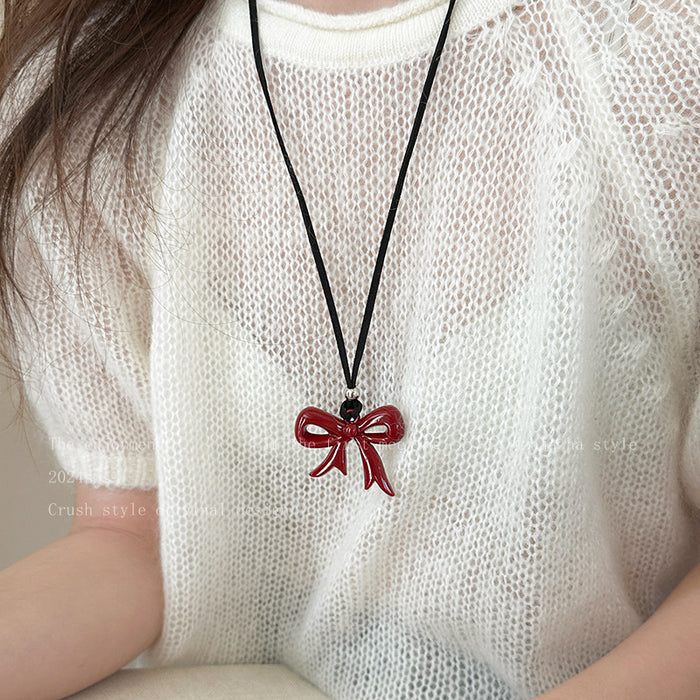 Wholesale Bow necklace, new minimalist style sweatshirt chain, niche and versatile black leather rope accessory