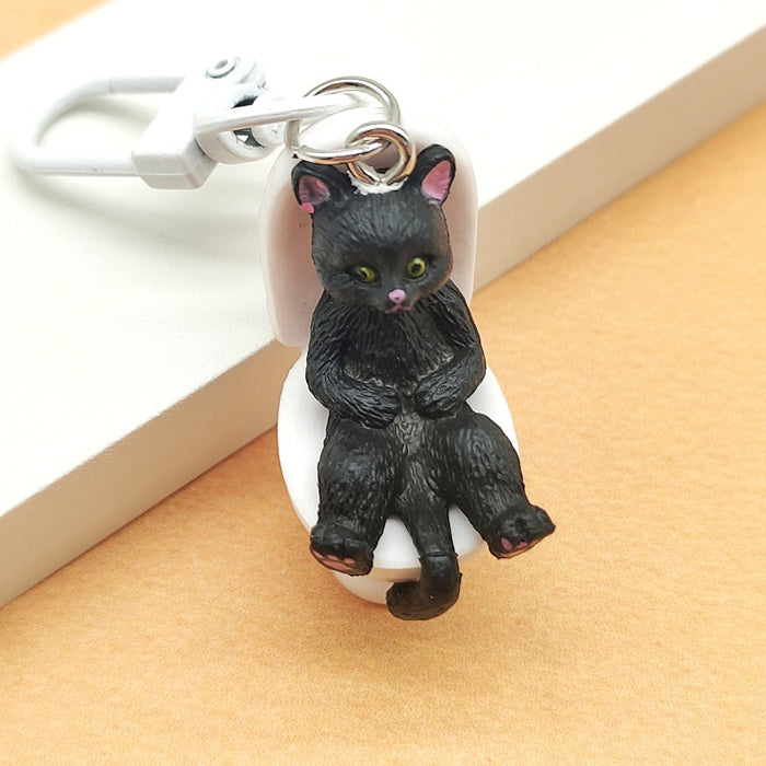 Wholesale Cartoon Sitting Toilet Kitten PVC Keychain JDC-KC-TYS019