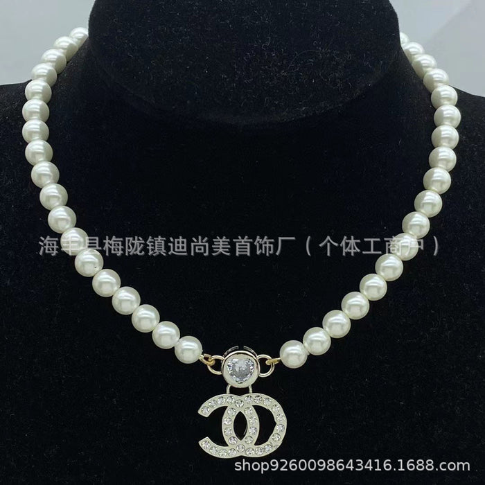 Wholesale Double C letter enamel camellia pearl long necklace