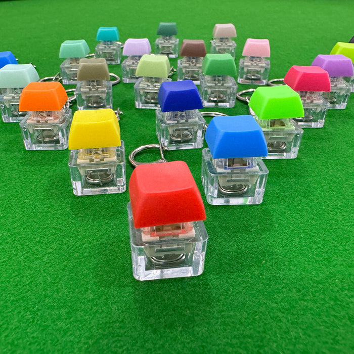 Wholesale Decompression keychain pendant, button tester, color illuminated decompression keychain