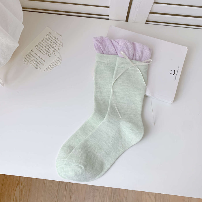 Wholesale Butterfly knot pile socks, cute and versatile pile socks