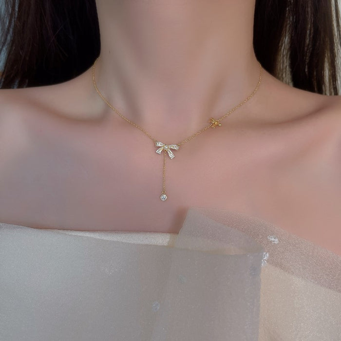 Wholesale Diamond studded bow zircon necklace, fashionable and niche design, collarbone chain pendant, necklace accessory