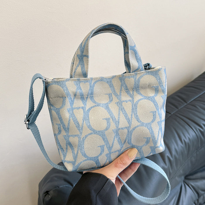 Wholesale Canvas letter printing portable small square bag trendy shoulder messenger bag