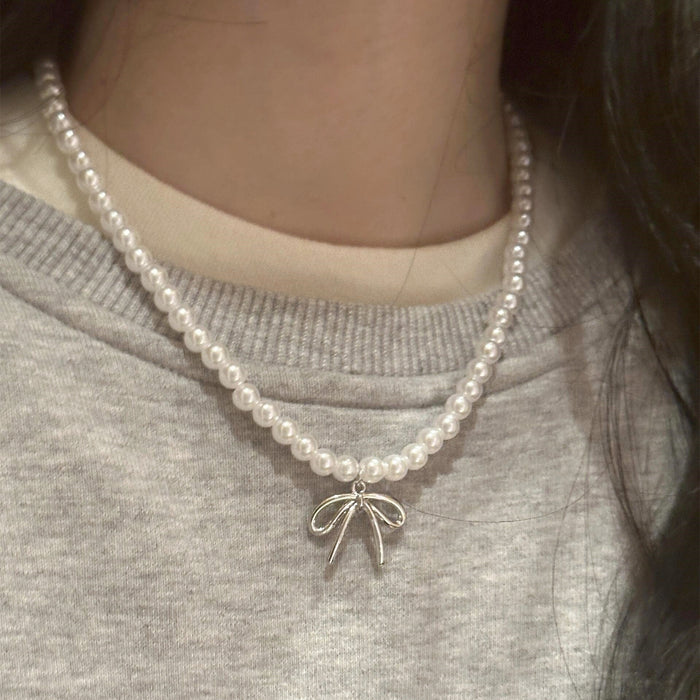Wholesale Pearl bow pendant necklace, light luxury collarbone chain, niche high-end sense, temperament necklace