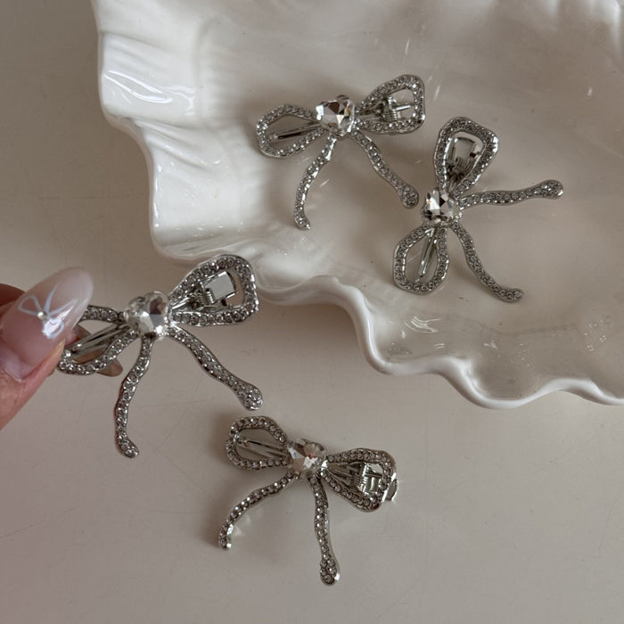 Wholesale Silver heart-shaped diamond bow hair clip, alloy duckbill clip, niche design, bangs clip, edge clip, hair accessory