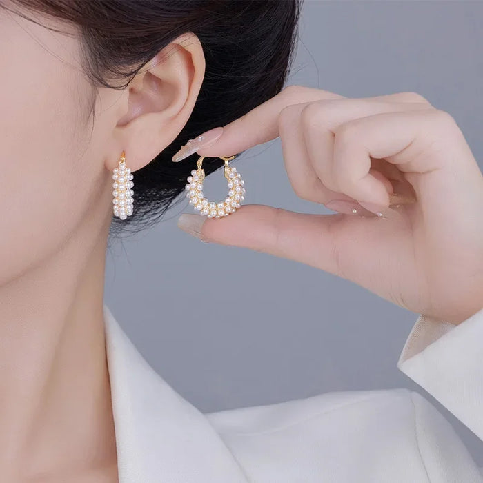 Wholesale Exquisite, fashionable, high-end pearl round ear buckle, light luxury, niche design, fashionable, gentle, versatile earrings