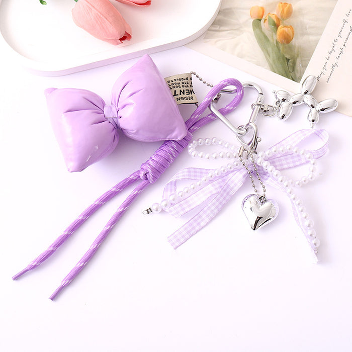 Wholesale Leather bow heart pendant luggage keychain lanyard accessories single buckle tassel pendant accessories