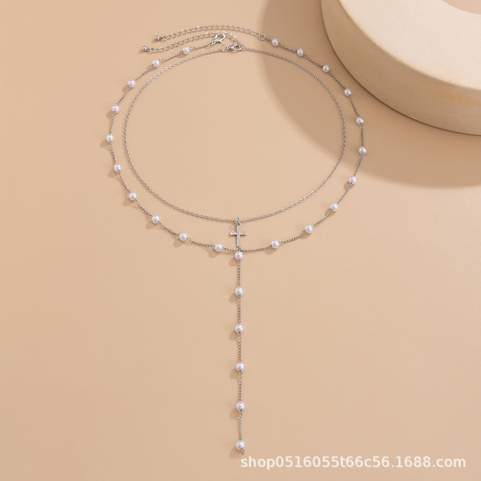 Wholesale Temperament imitation pearl chain long tassel necklace simple cross pendant collarbone chain