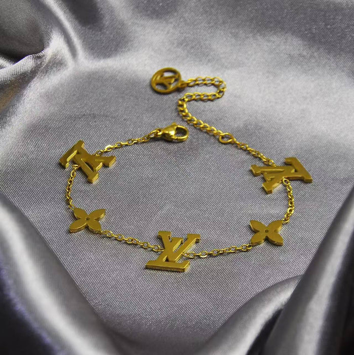 Wholesale Smooth and minimalist titanium steel bracelet with letters that never fade, exuding a sense of luxury