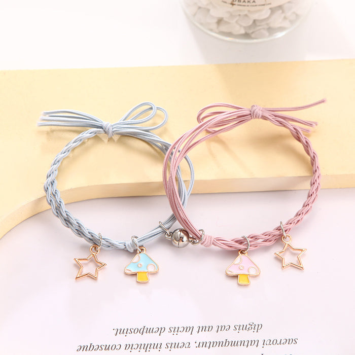 Wholesale Cartoon couple bracelets a pair of small rubber band magnets attract bell bracelet gift