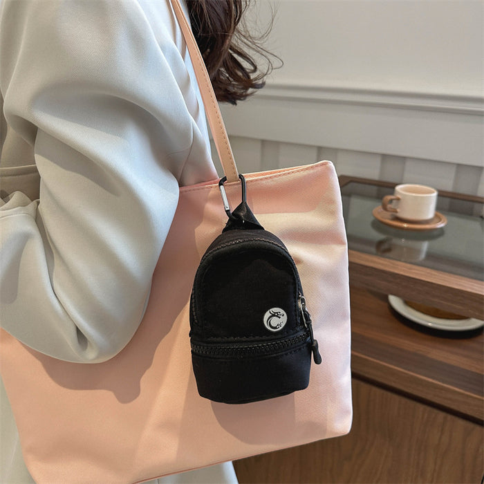 Wholesale contrast color schoolbag coin purse mini keychain pendant portable boys and girls earphone certificate storage pouch
