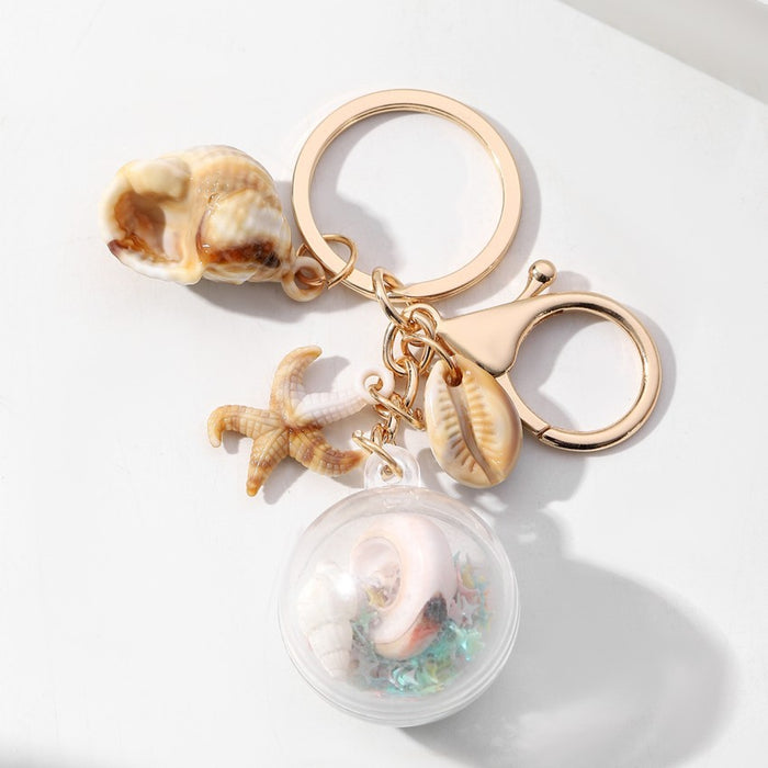 Wholesale Luminous Conch Sequin Small Ball Acrylic Keychain JDC-KC-RongRui055