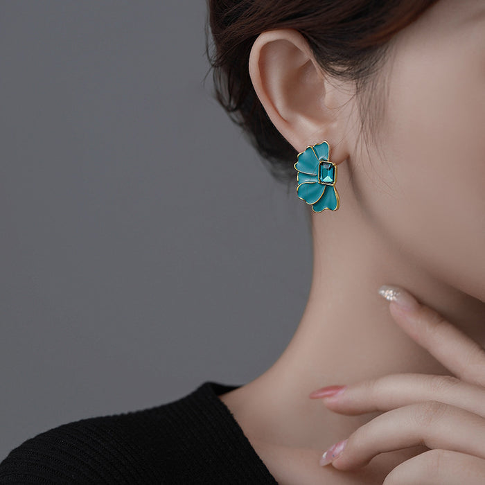 Wholesale Retro and minimalist design earrings with oil dripping, diamond studded, flower like temperament, fashionable earrings