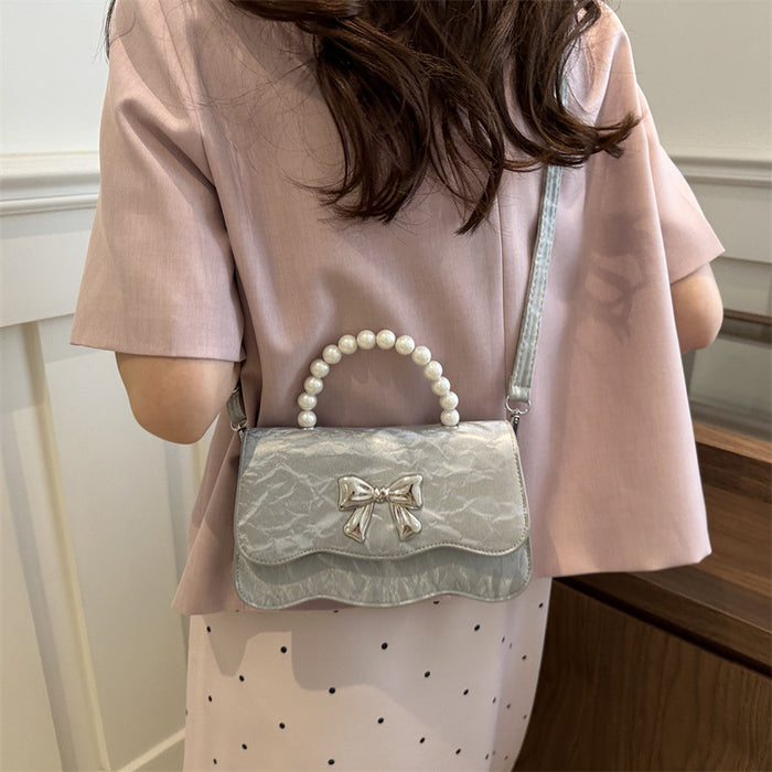 Wholesale Fashionable pearl handbag, crossbody, stylish design, butterfly texture small square bag