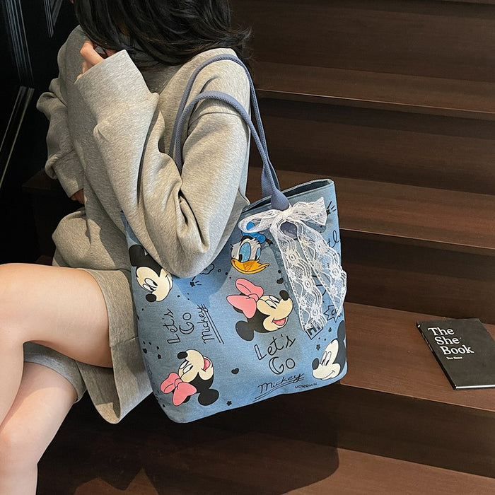 Wholesale Cartoon canvas bag, new versatile shoulder bag, student commuting tote bag, large capacity tote bag