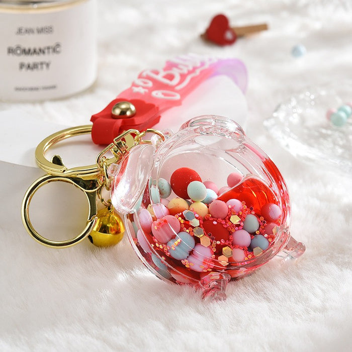 Wholesale Acrylic oil bottle candy Bean astronaut keychain