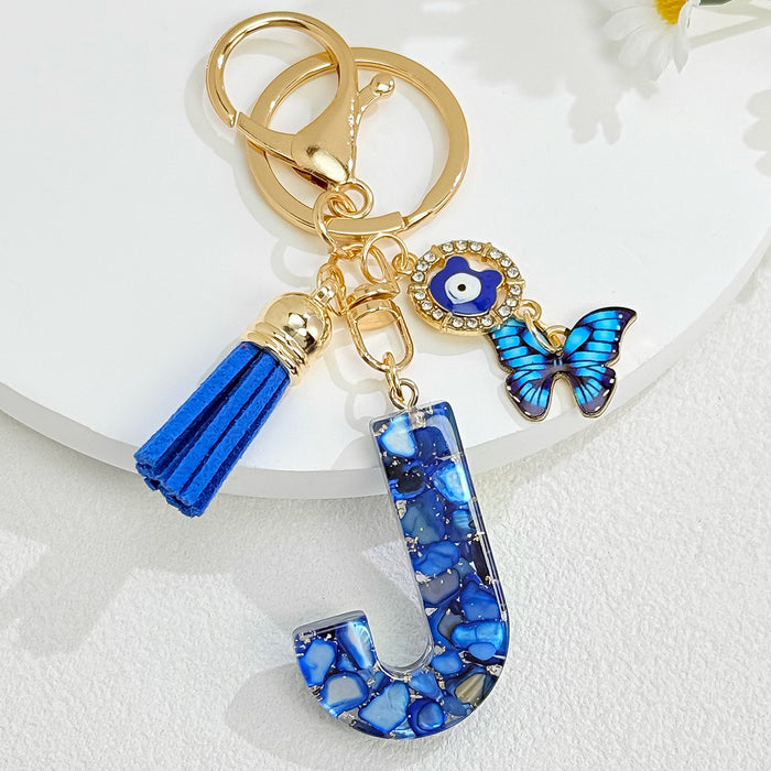 Wholesale Royal Blue 26 Letter Keychain with Evil Eye Butterfly Tassel Pendant