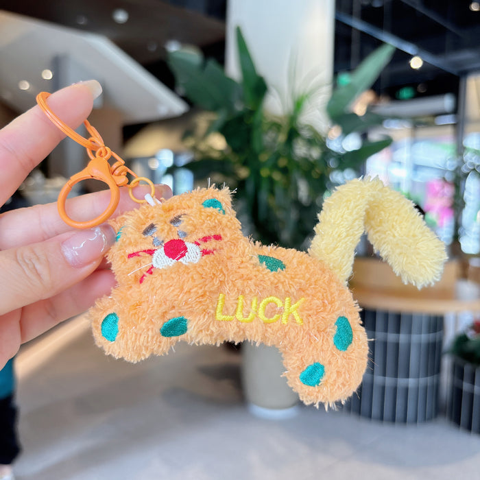 Wholesale Creative cartoon polka dot leopard doll keychain DIY twist tail decompression doll student pendant