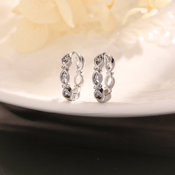 Wholesale Subtle temperament, high-end earrings, hollowed out earrings with diamond inlay