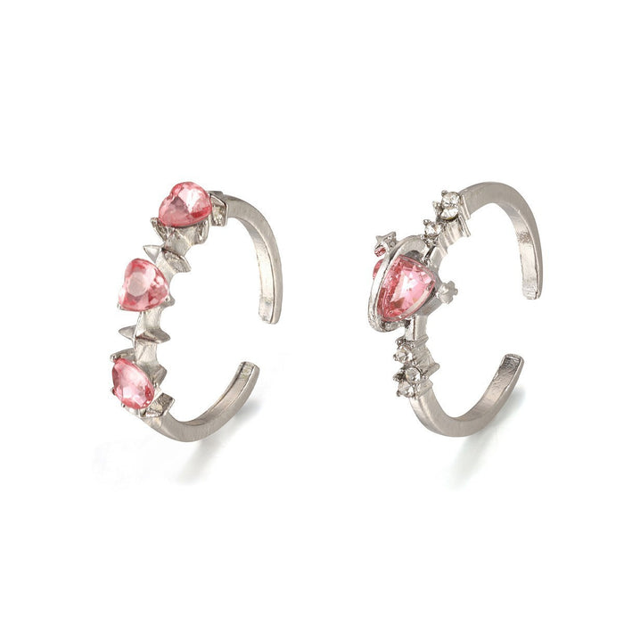Wholesale Set of open-faced diamond-encrusted heart-shaped rings.