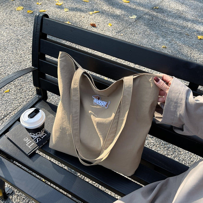 Wholesale Large capacity canvas bag, niche commuting handheld, high-end fashion shoulder bag
