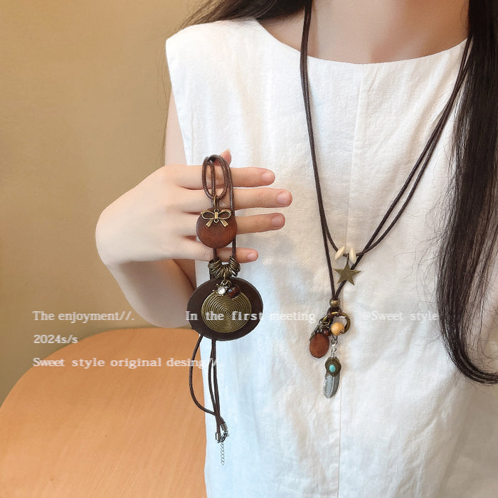 Wholesale Vintage feather necklace, double-layer layered long sweater chain accessory