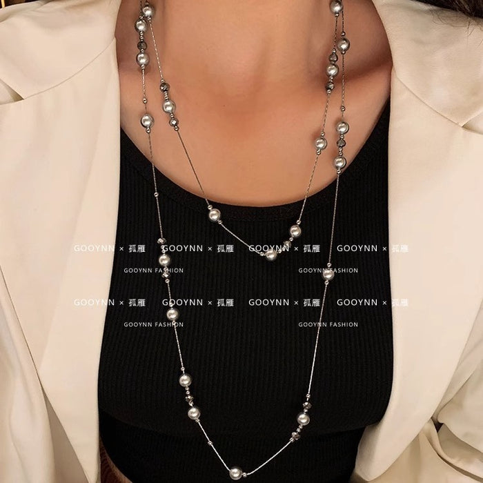 Wholesale Long pearl necklace, niche, light luxury, high-end, fashionable, versatile, layered sweater chain