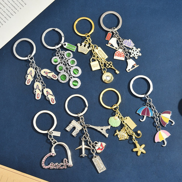 Wholesale Trendy Multi Pendant Aluminum Alloy Keychain Beach Vacation Cute Cartoon Theme Bag Charm