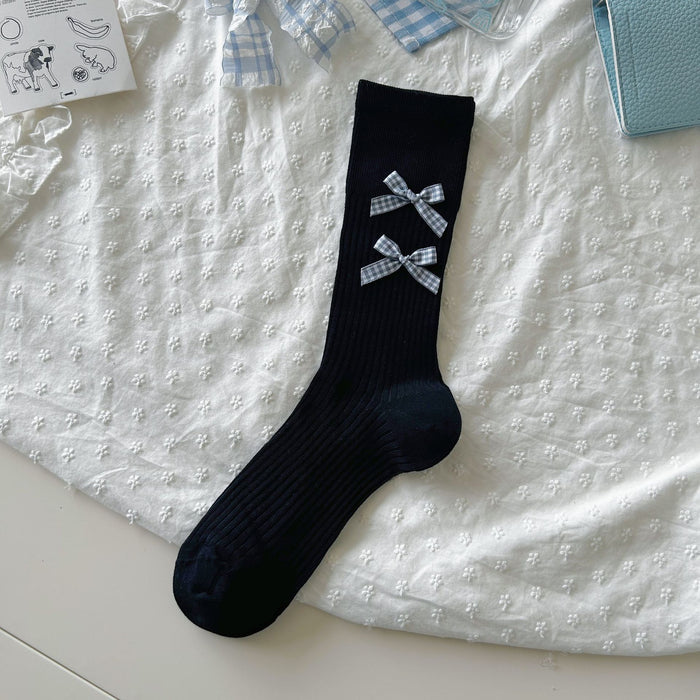Wholesale Bow tie socks, long tube pile socks