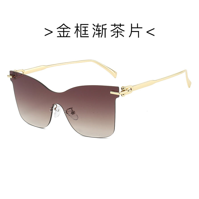 Wholesale Frameless one-piece sunglasses with a high-end feel, personalized trendy glasses, UV resistant cat eye retro sunglasses