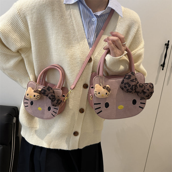 Wholesale Cute cartoon shoulder bag with leopard print bow.