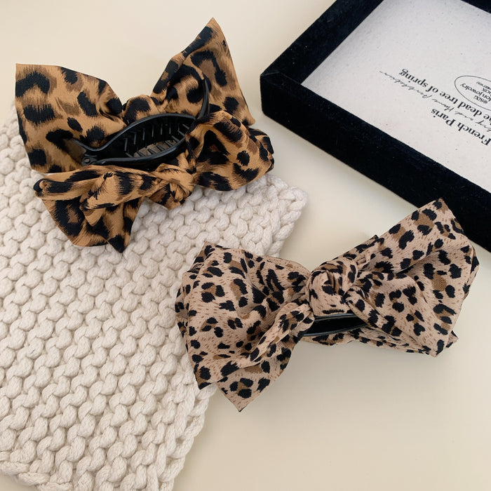 Wholesale Leopard print bow ball head clip female retro high ponytail fixed hairpin back of the head hair shark clip