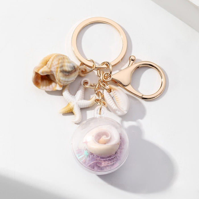 Wholesale Luminous Conch Sequin Small Ball Acrylic Keychain JDC-KC-RongRui055