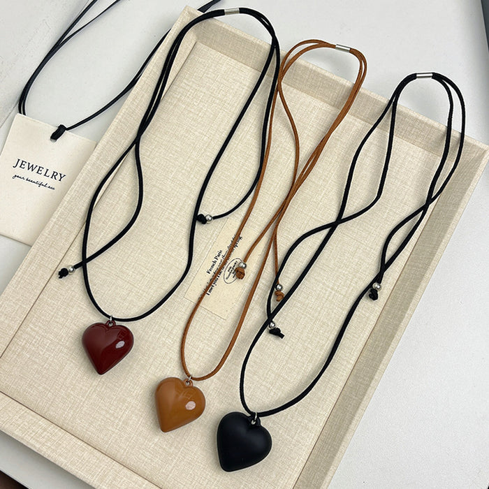 Wholesale Love pendant necklace, long leather rope adjustable sweater chain, high-end sweatshirt accessory