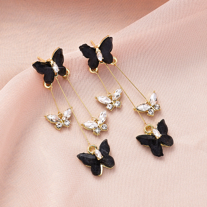 Wholesale Silver needle purple butterfly tassel earrings with a light luxury and high-end feel, sparkling diamond long earrings, retro temperament earrings
