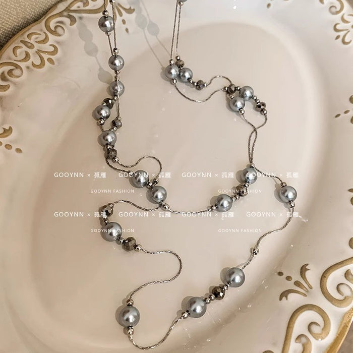 Wholesale Long pearl necklace, niche, light luxury, high-end, fashionable, versatile, layered sweater chain