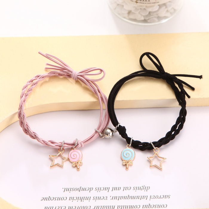 Wholesale Cartoon couple bracelets a pair of small rubber band magnets attract bell bracelet gift