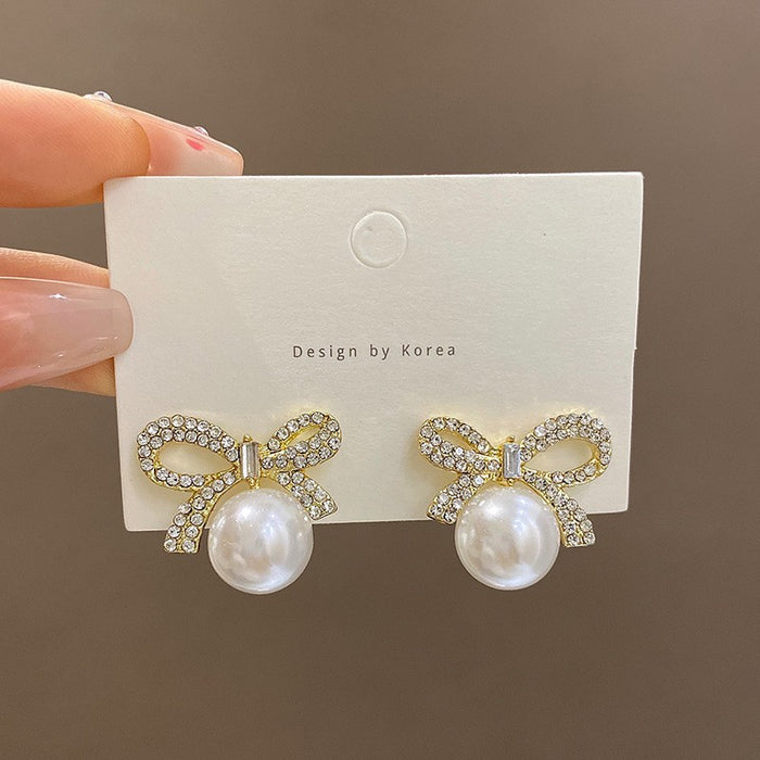 Wholesale Luxury bow earrings, niche design, pearl earrings, elegant earrings