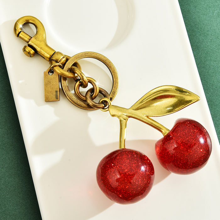 Wholesale Red cherry-shaped metal keychain