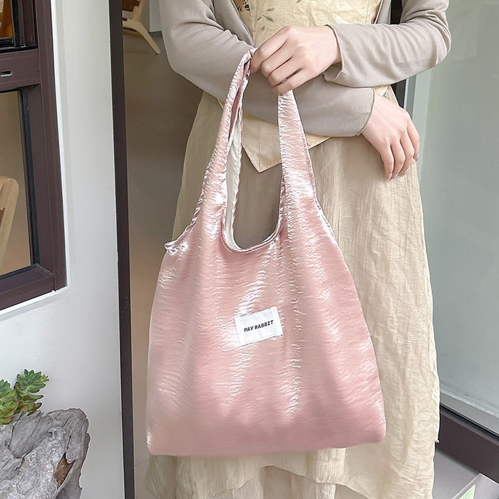 Wholesale Small niche design, environmentally friendly silver shoulder bag, large capacity leisure commuting shopping bag, handheld